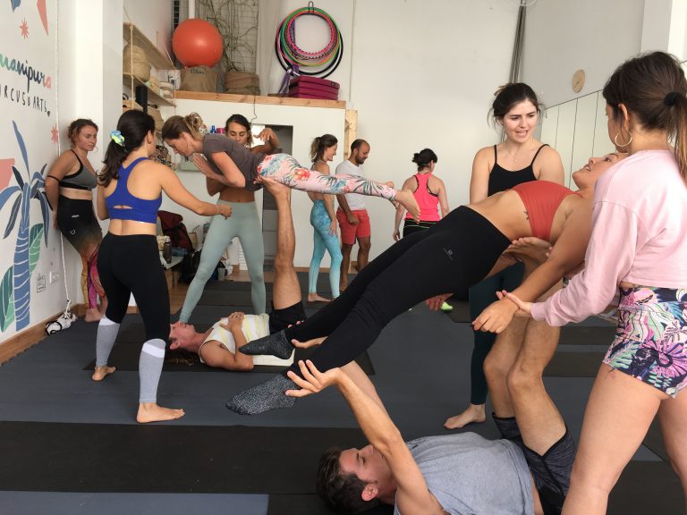 Partner yoga acrobatics class